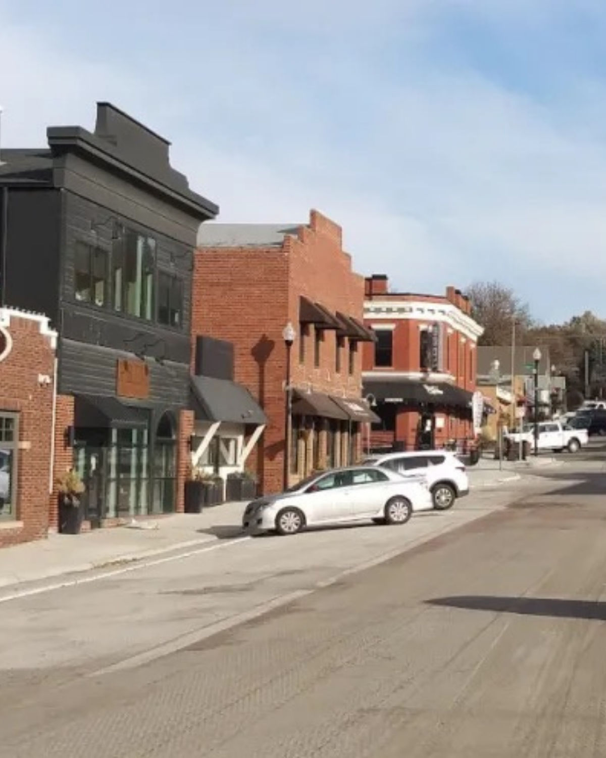 Olde Towne Elkhorn with brick streets, historic storefronts, and a small-town main street feel.