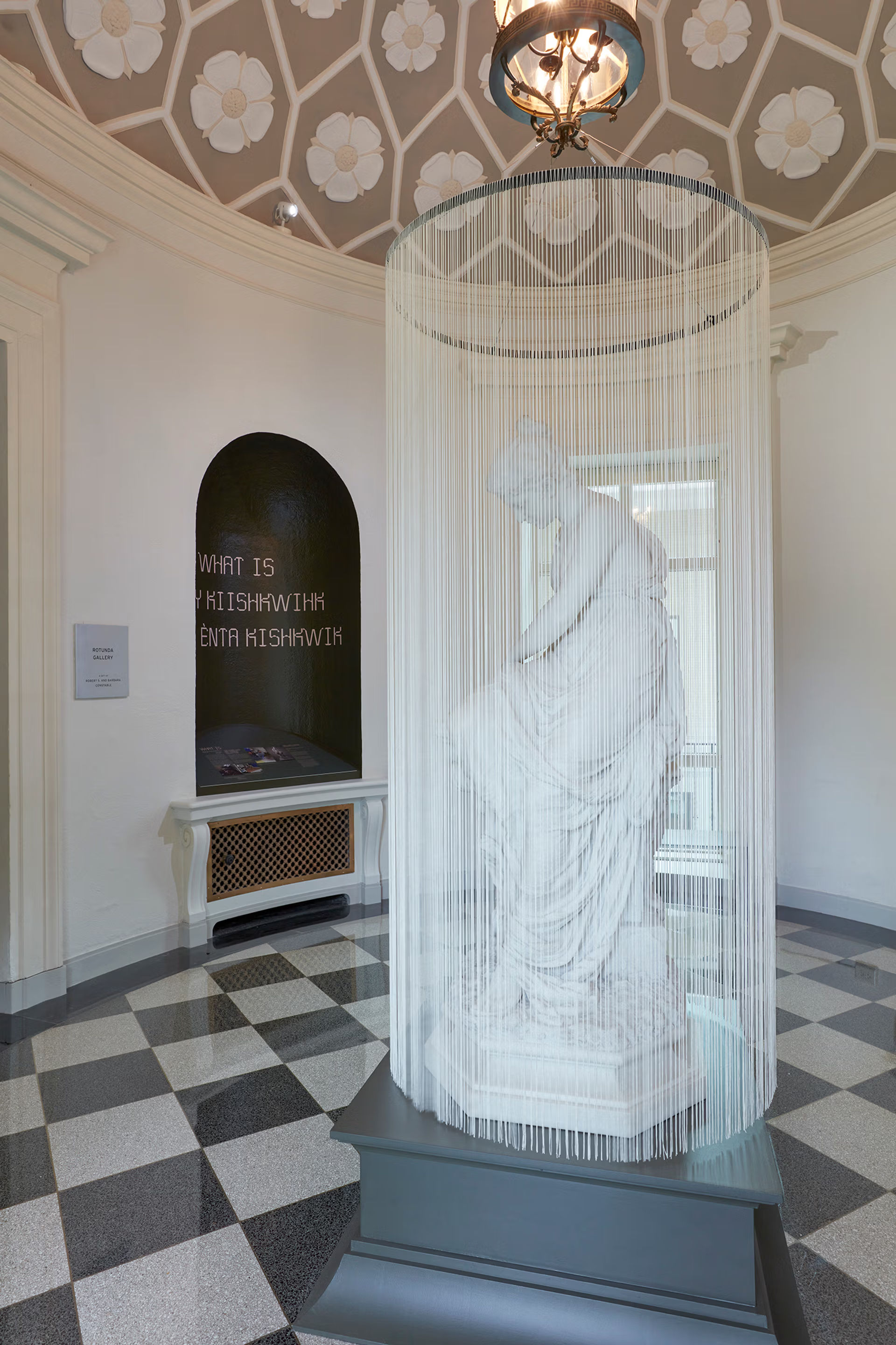 Interior of the Montclair Art Museum in Montclair, New Jersey, featuring a contemporary sculpture installation beneath an ornate rotunda ceiling.