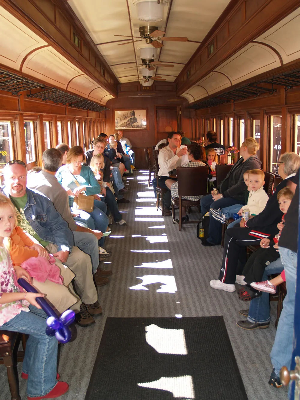 Passengers seated inside a restored historic railcar at the Whippany Railway Museum in Whippany, New Jersey.