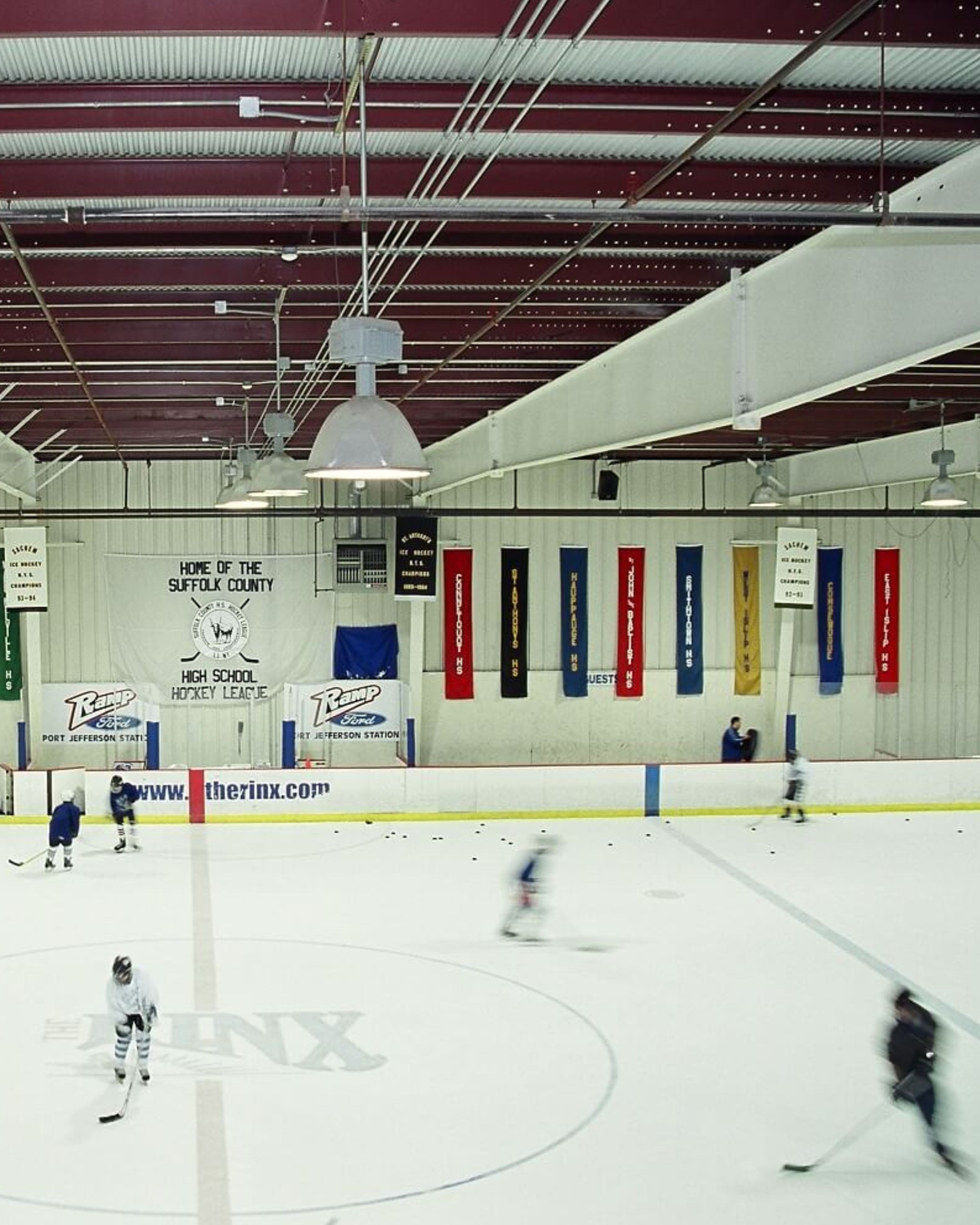 Players practice on the ice at The Rinx in Hauppauge, New York, highlighting the area’s active community, family-friendly recreation, and strong youth sports culture on Long Island.