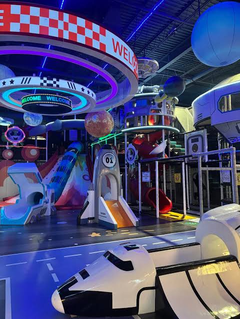Space-themed indoor attractions at Catch Air Nanuet in Nanuet, New York, a family entertainment destination near HappyNest laundry pickup and delivery customers.