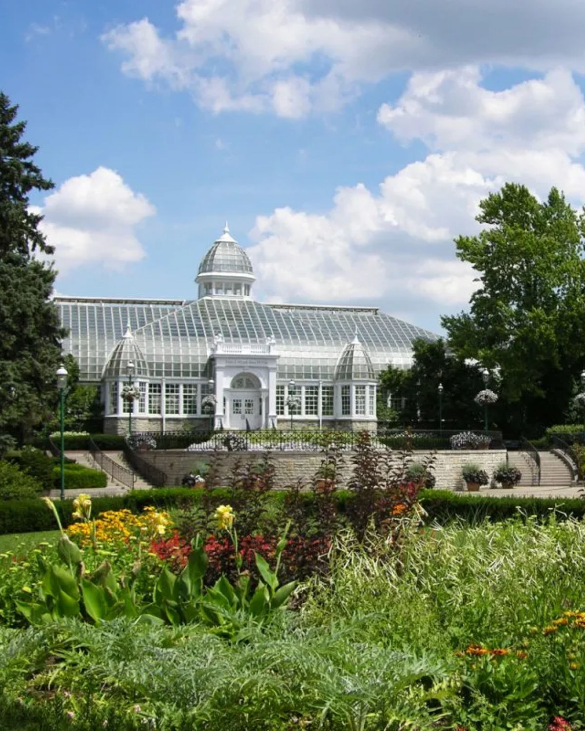 An assortment of flowers and plants surrounding the Franklin Park Conservatory and Botanical Gardens in Columbus, OH