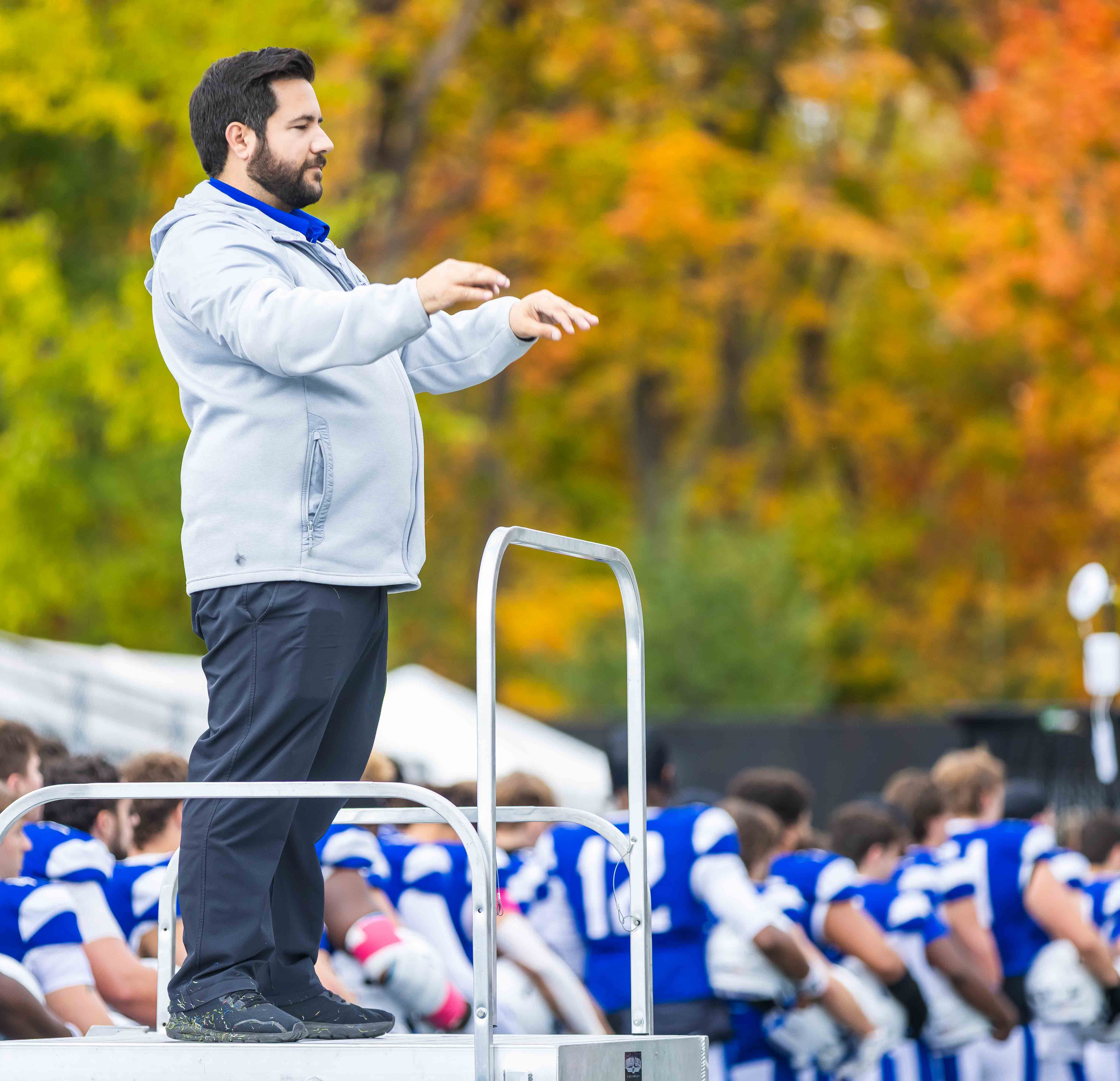 Alexander Floury, LTU marching band director, conducts the band during the 2025 LTU vs. Taylor football game.