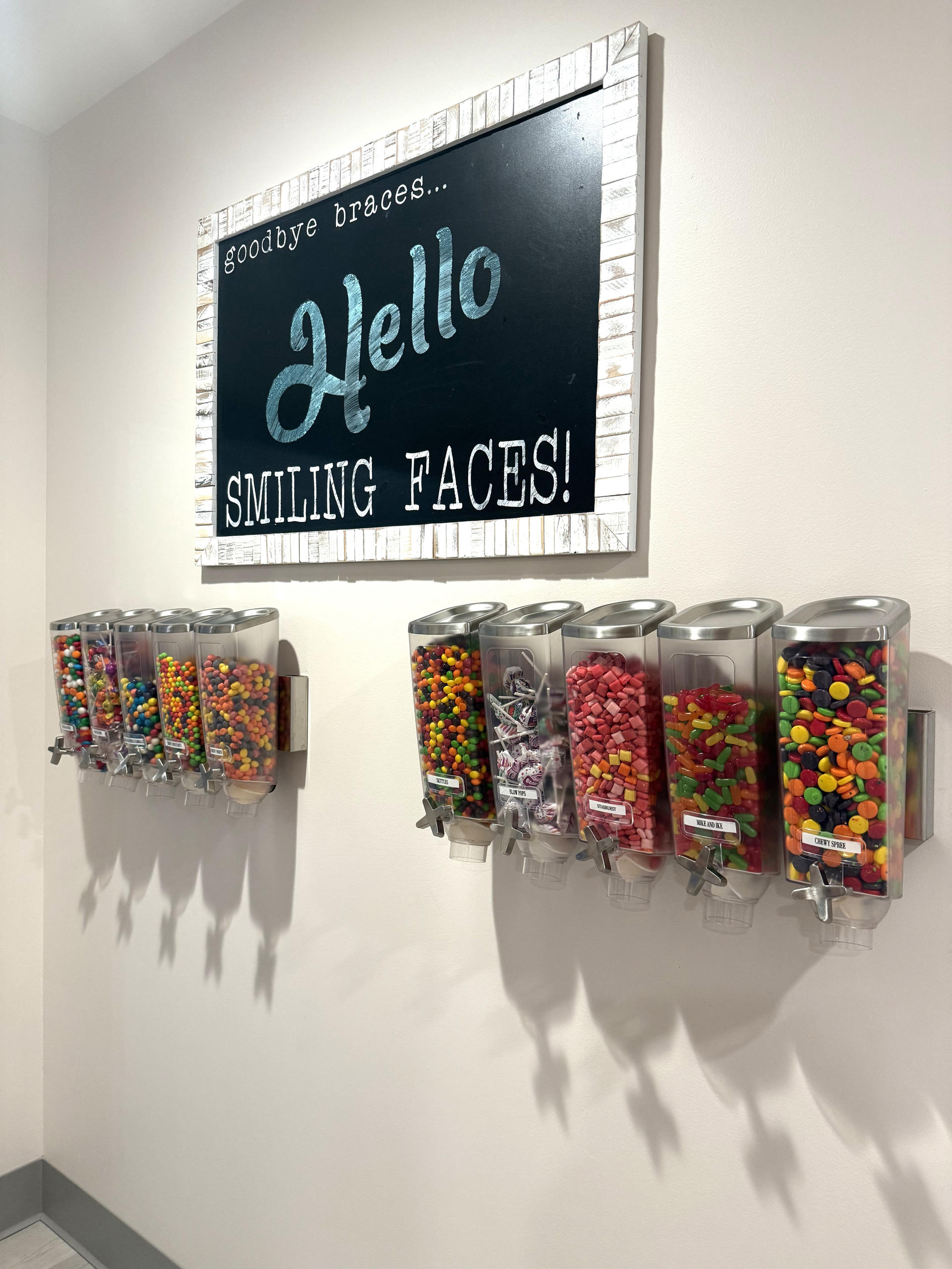 ten wall mounted candy dispensers at Doyle Orthodontics