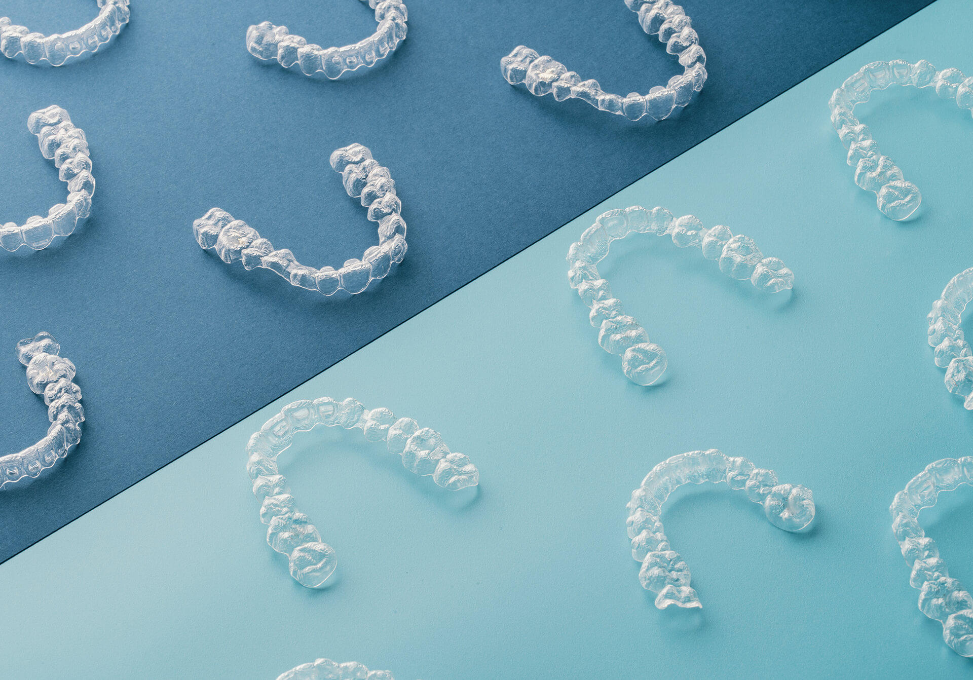 invisalign aligners on a two-tone surface