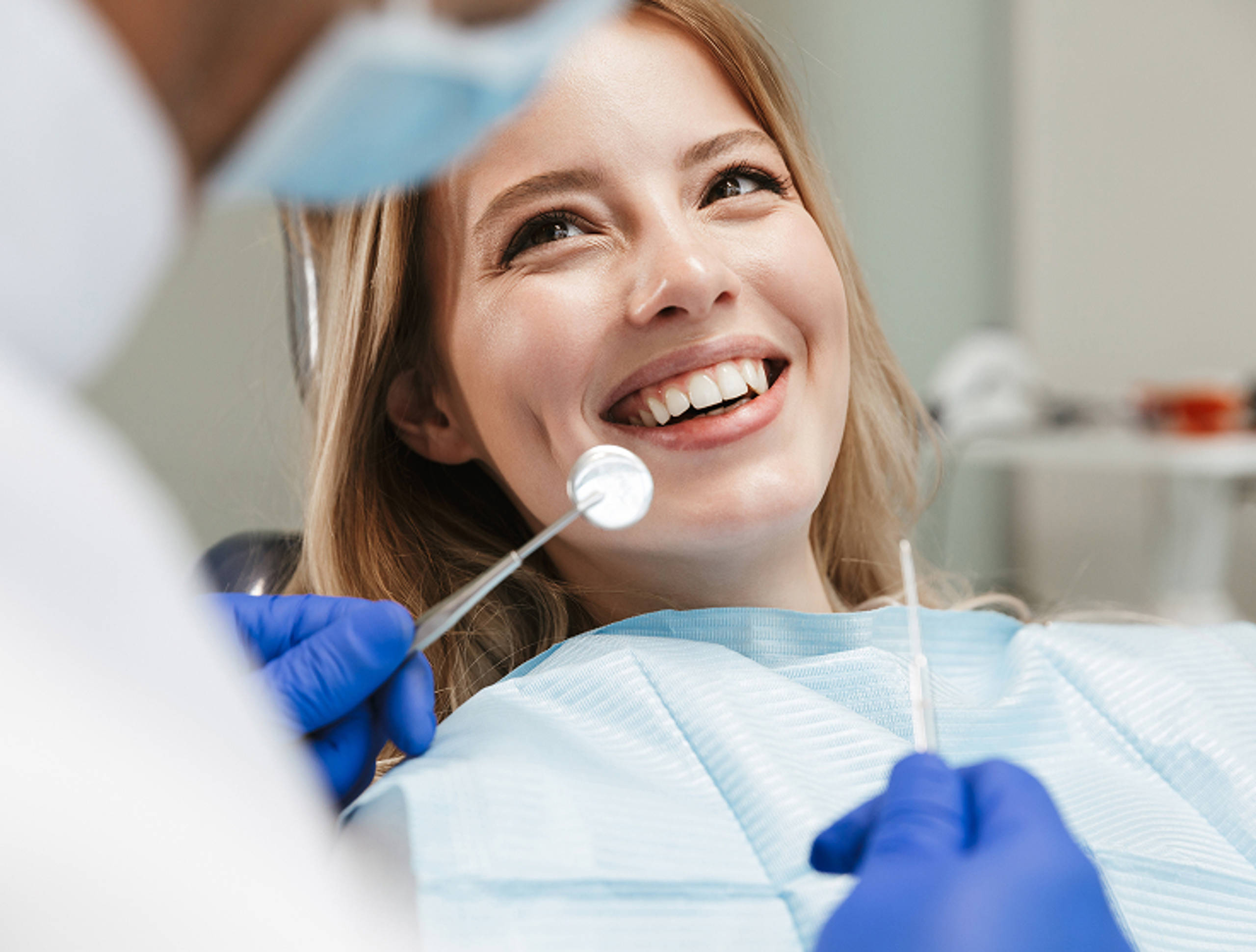 woman smiling in dental chair