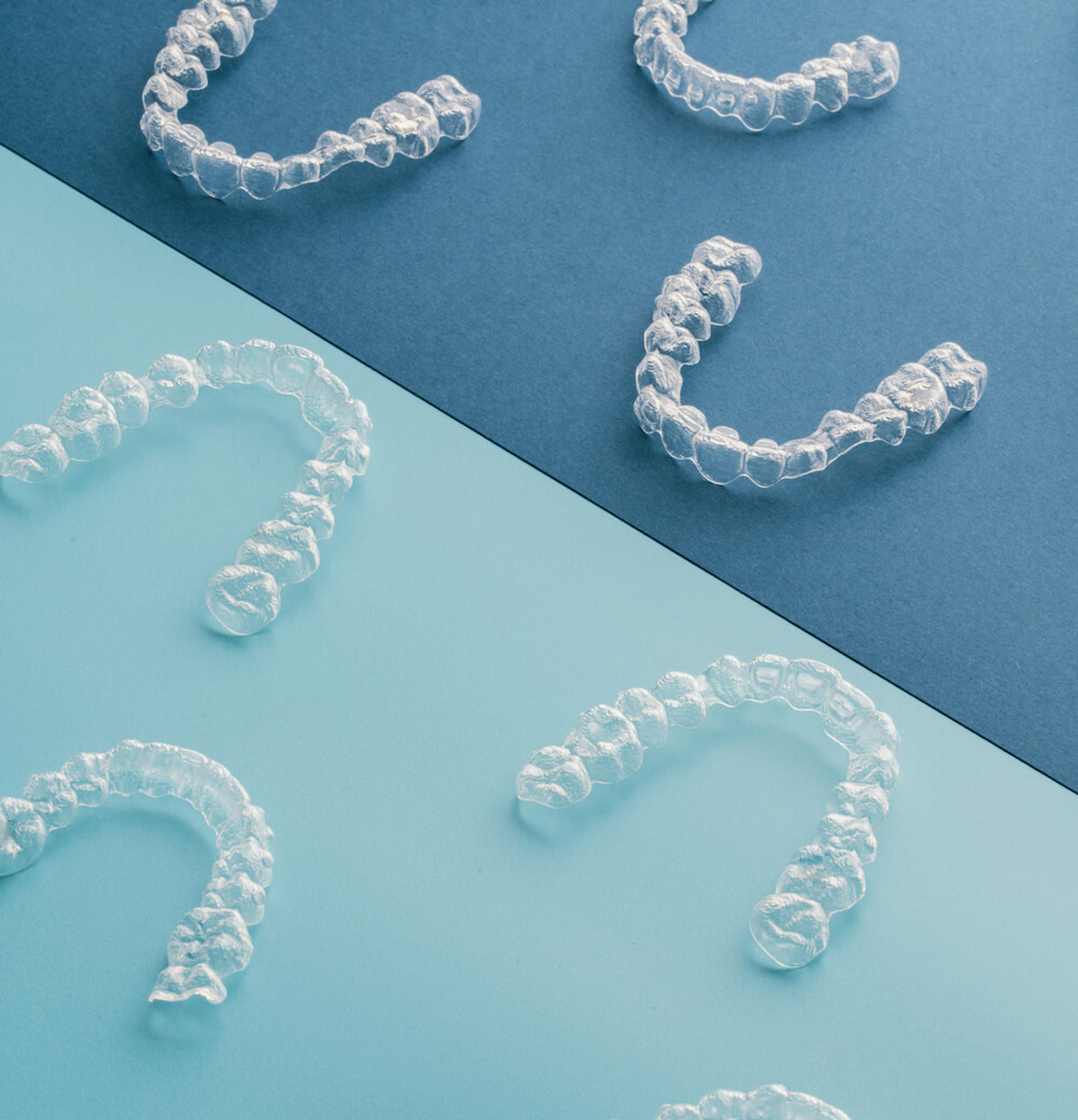 Clear aligners displayed on a treatment tray at Reynolds Orthodontics