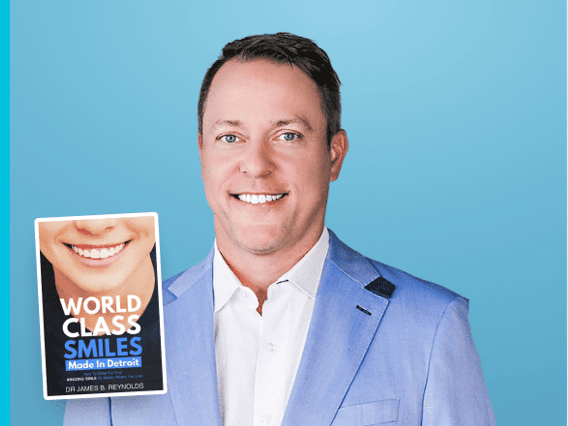 Dr. Jamie Reynolds holding his book World Class Smiles