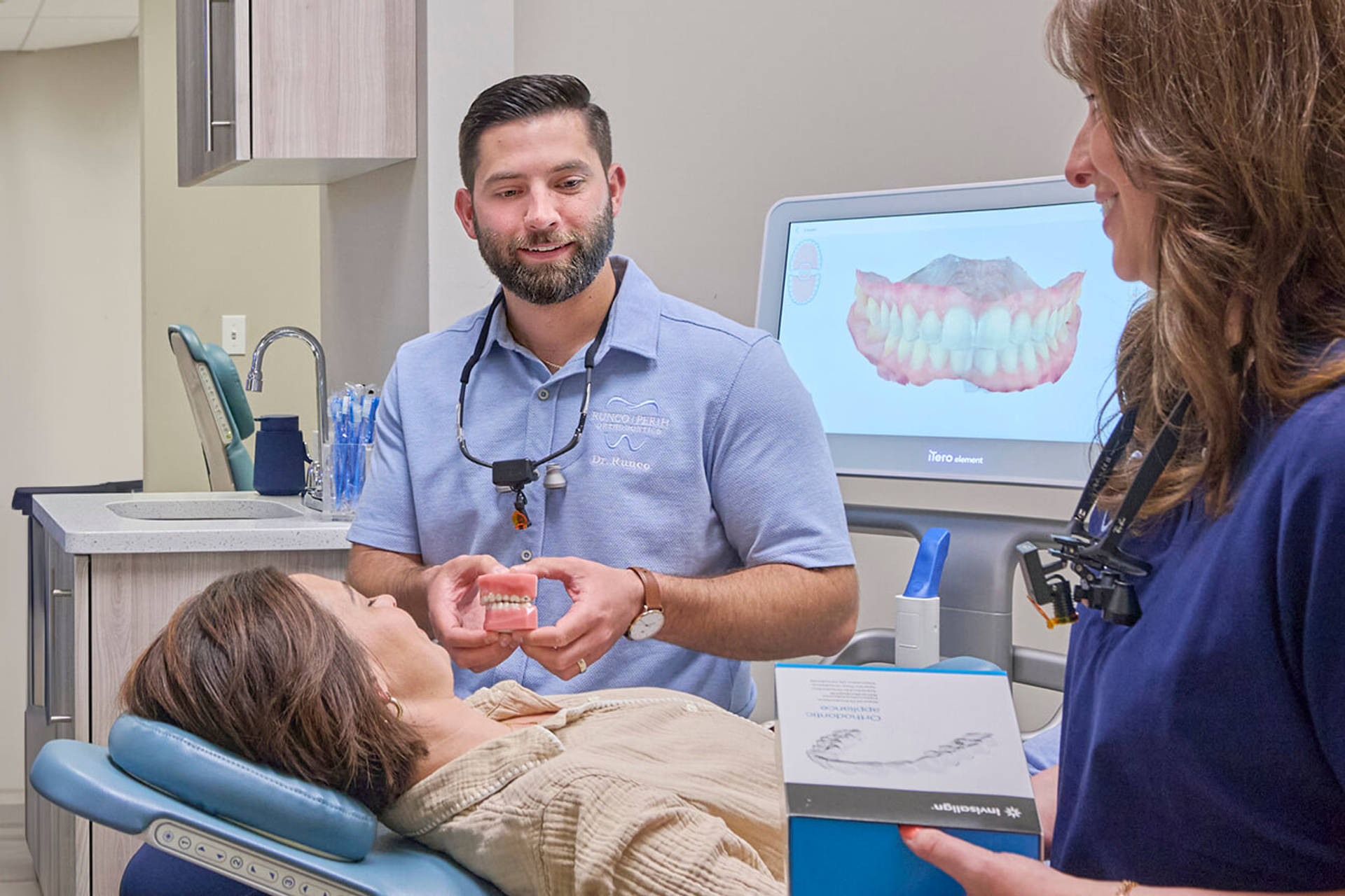 Dr. Runco talking to patient
