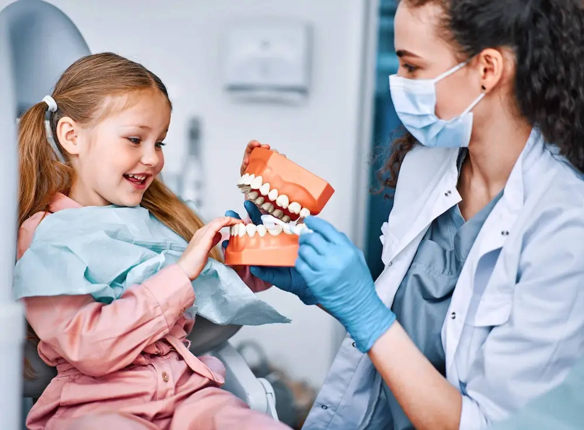 orthodontist talking with child