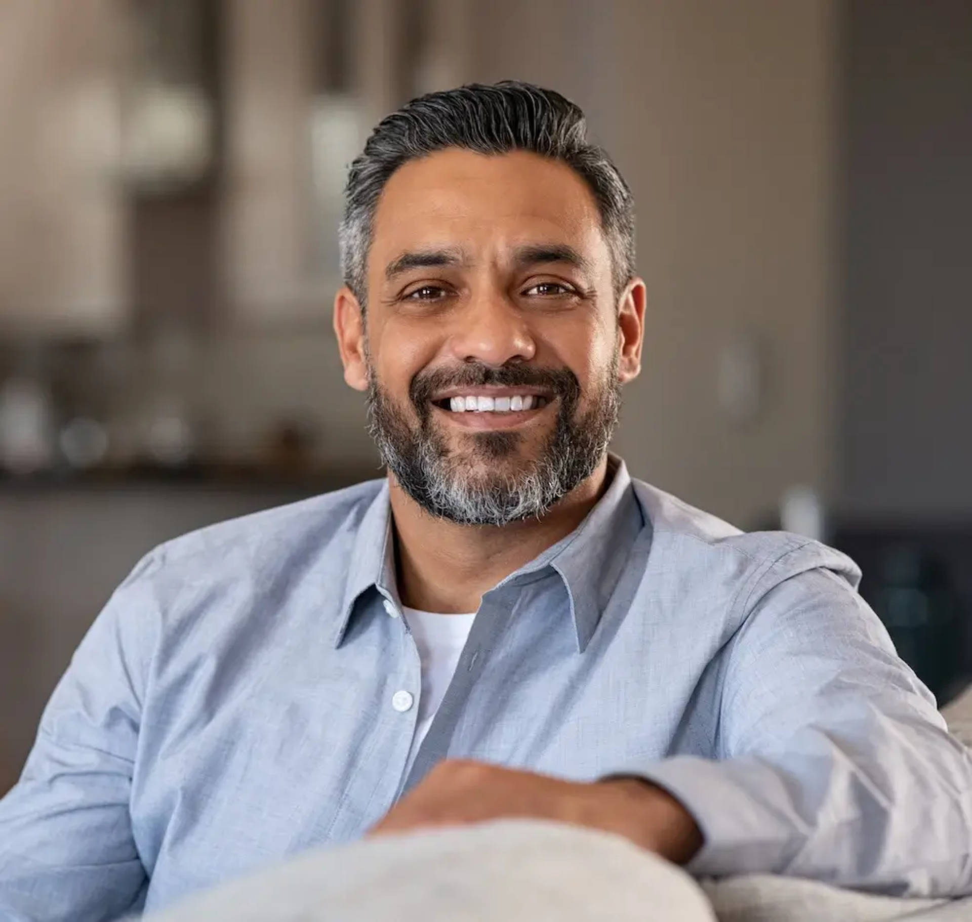 smiling sitting man