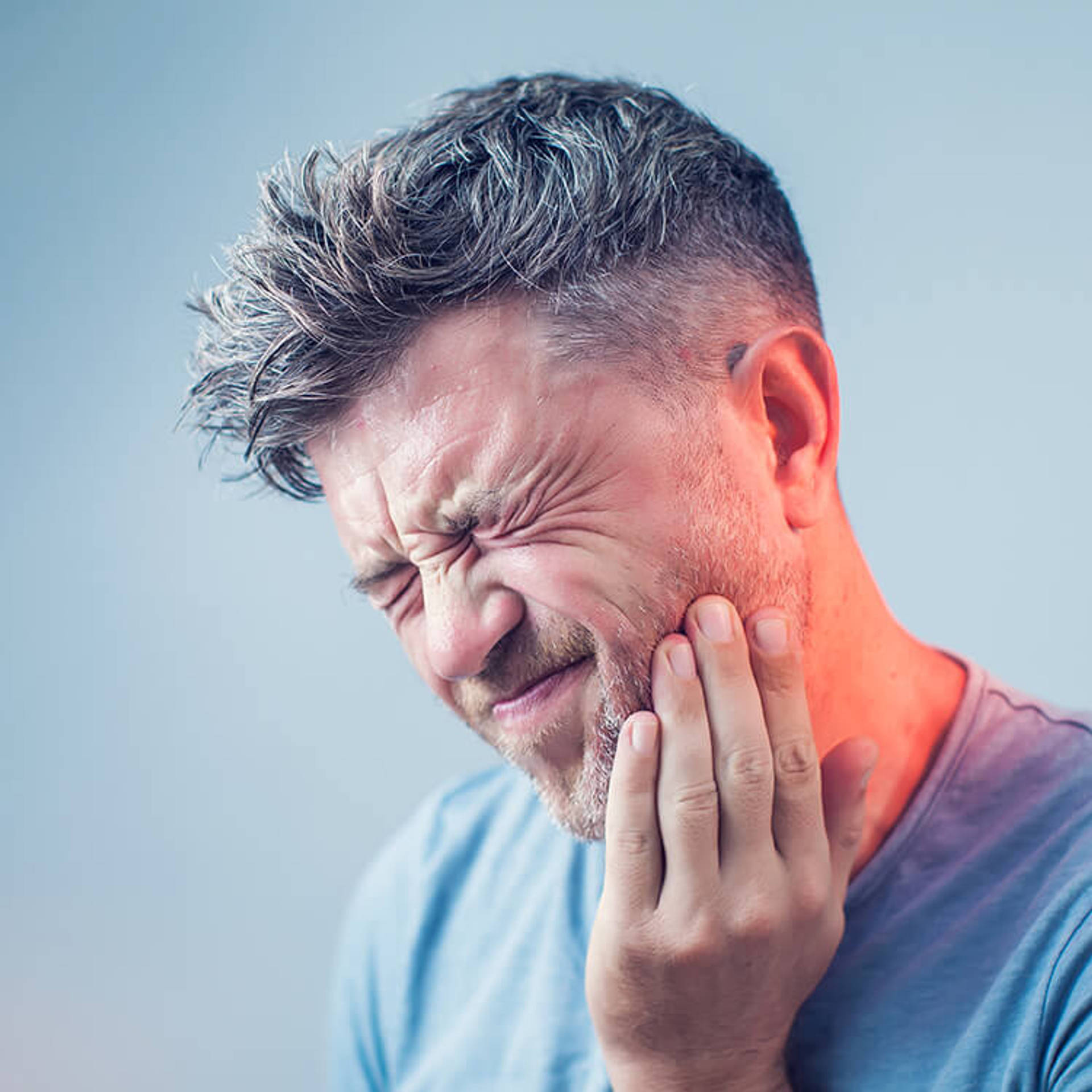 Toothache, medicine, health care concept, Teeth Problem, young man suffering from tooth pain, caries
