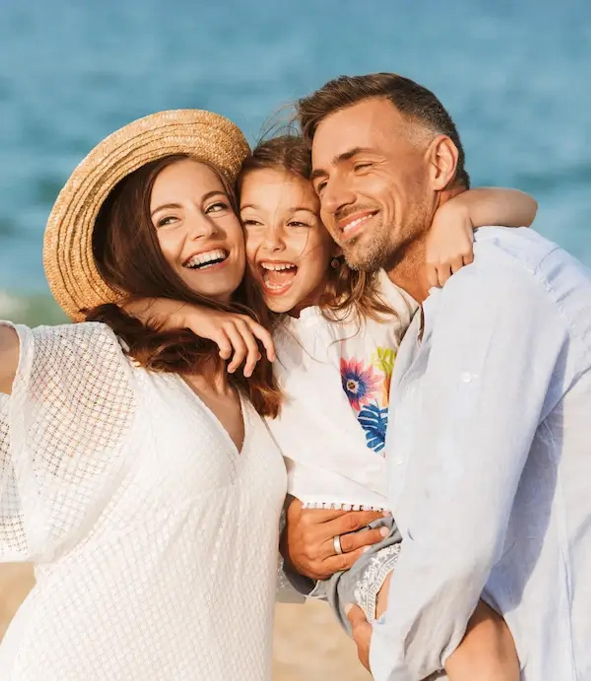 laughing family at beach