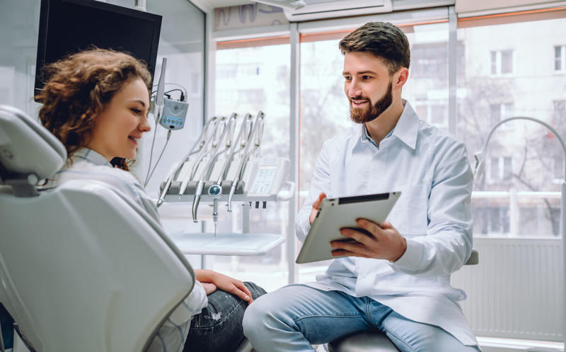 Orthodontist with patient