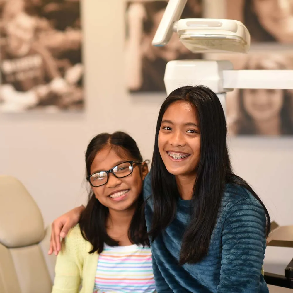 sisters smiling