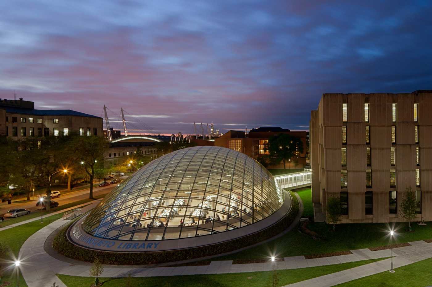 Large glass domed library in a city environment