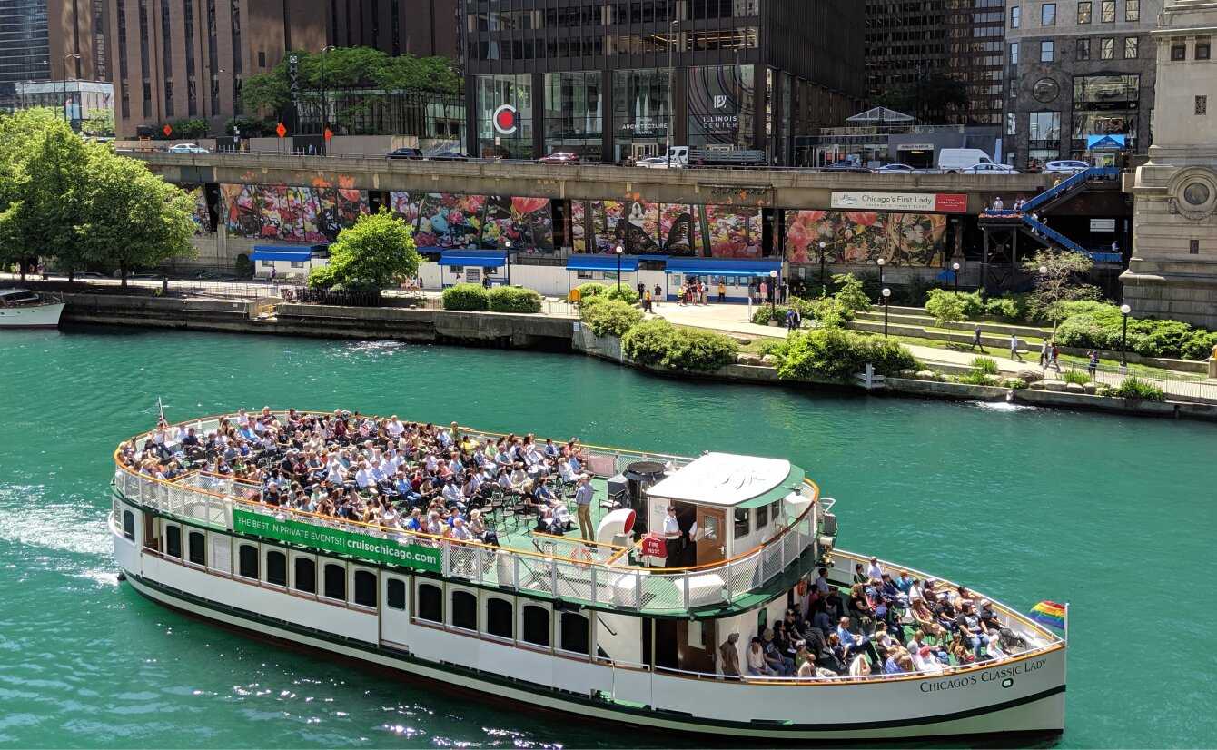 A boat full of tour-goings on the Chicago River