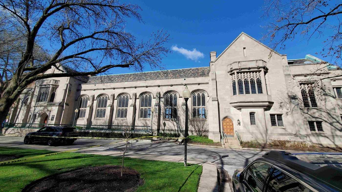 Grey stone building with many windows