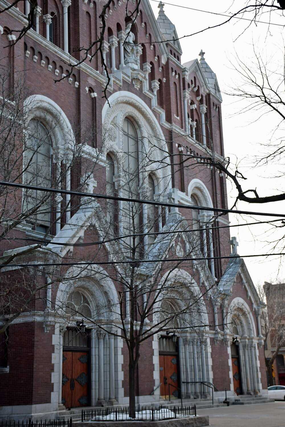 Exterior view of gothic church with white arches