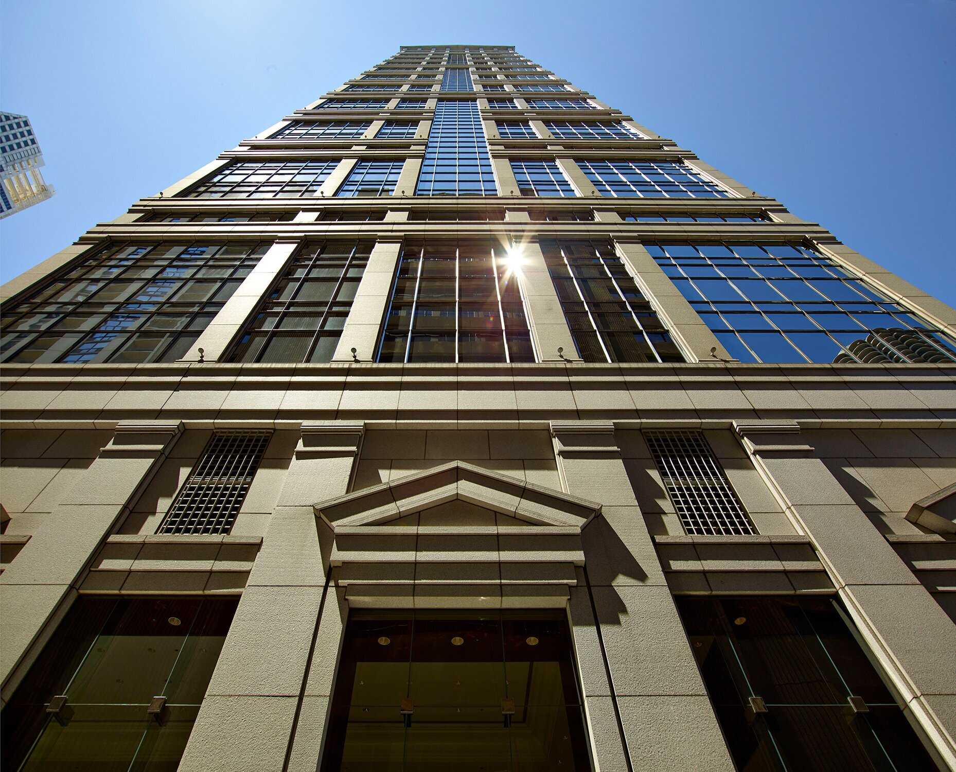 A photo looking up at 77 W. Wacker from street-level.