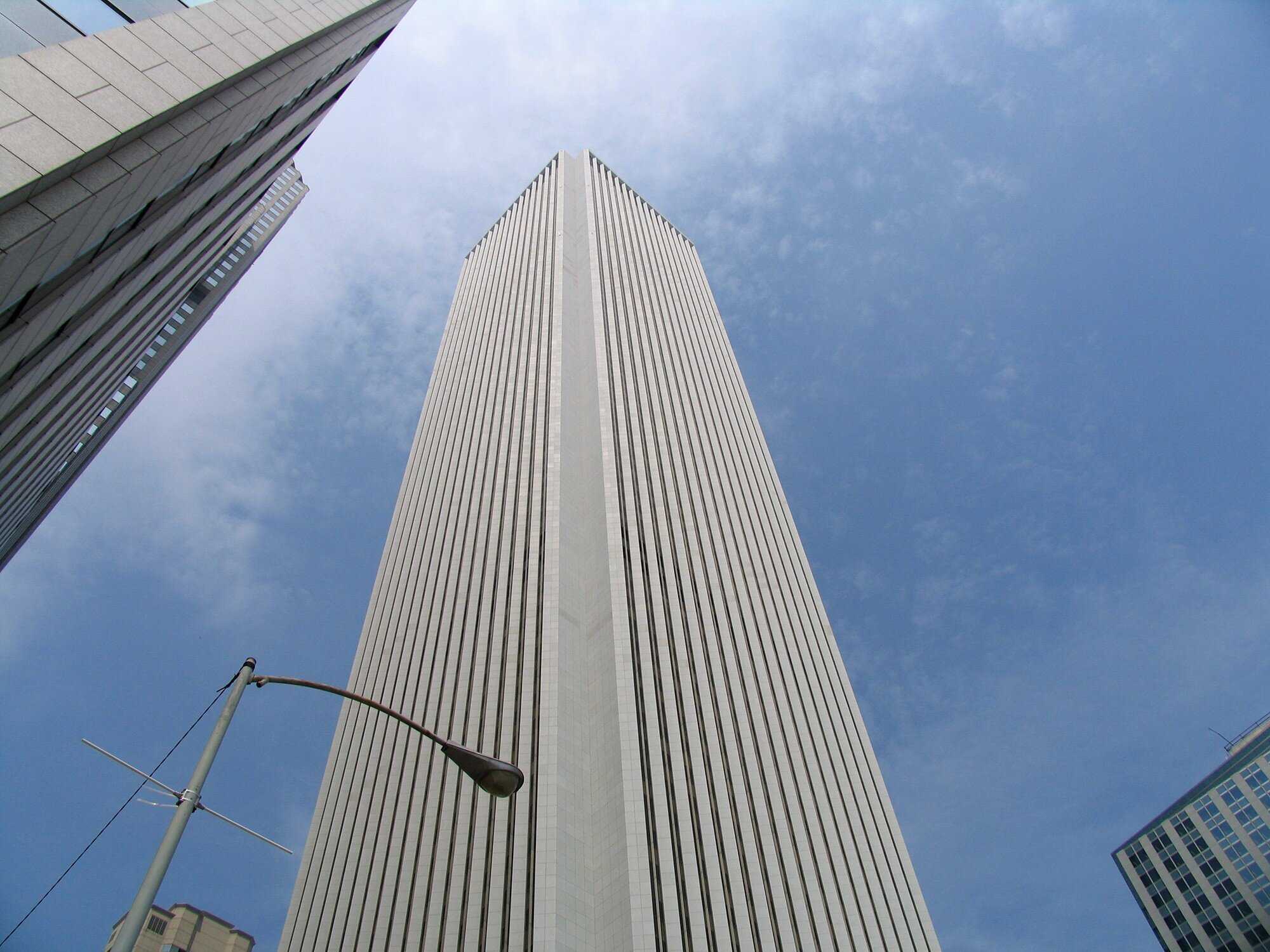 A photo of the corner of theAON Center from street level.