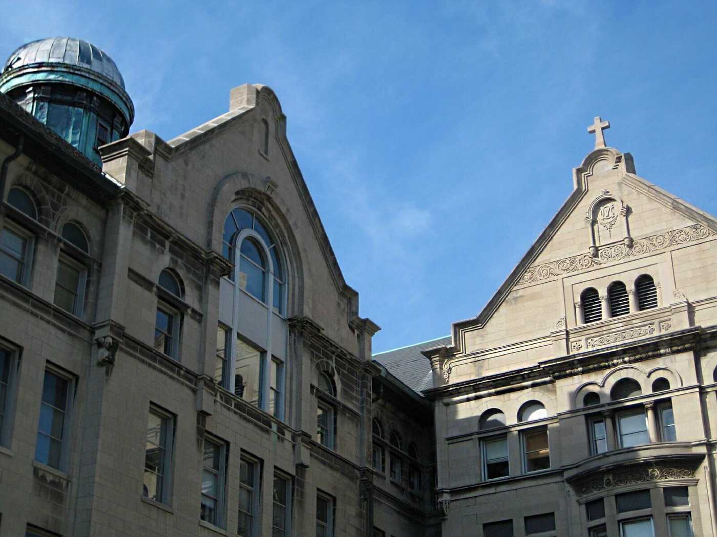 Stone building with ornate architecture and a decorative facade.