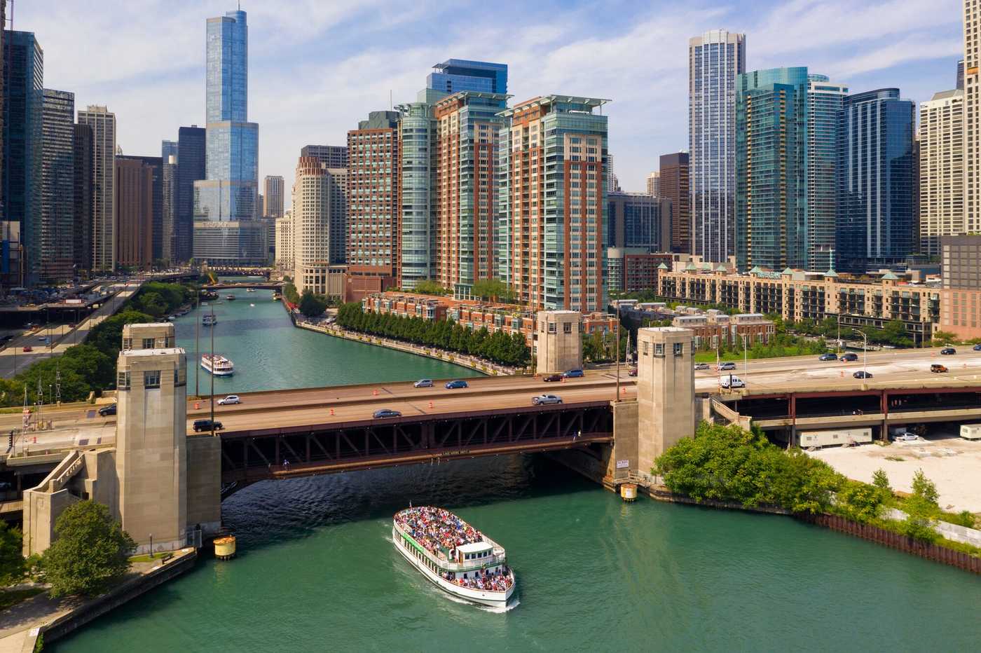 Aerial view of the Chicago River with bridge and large boat