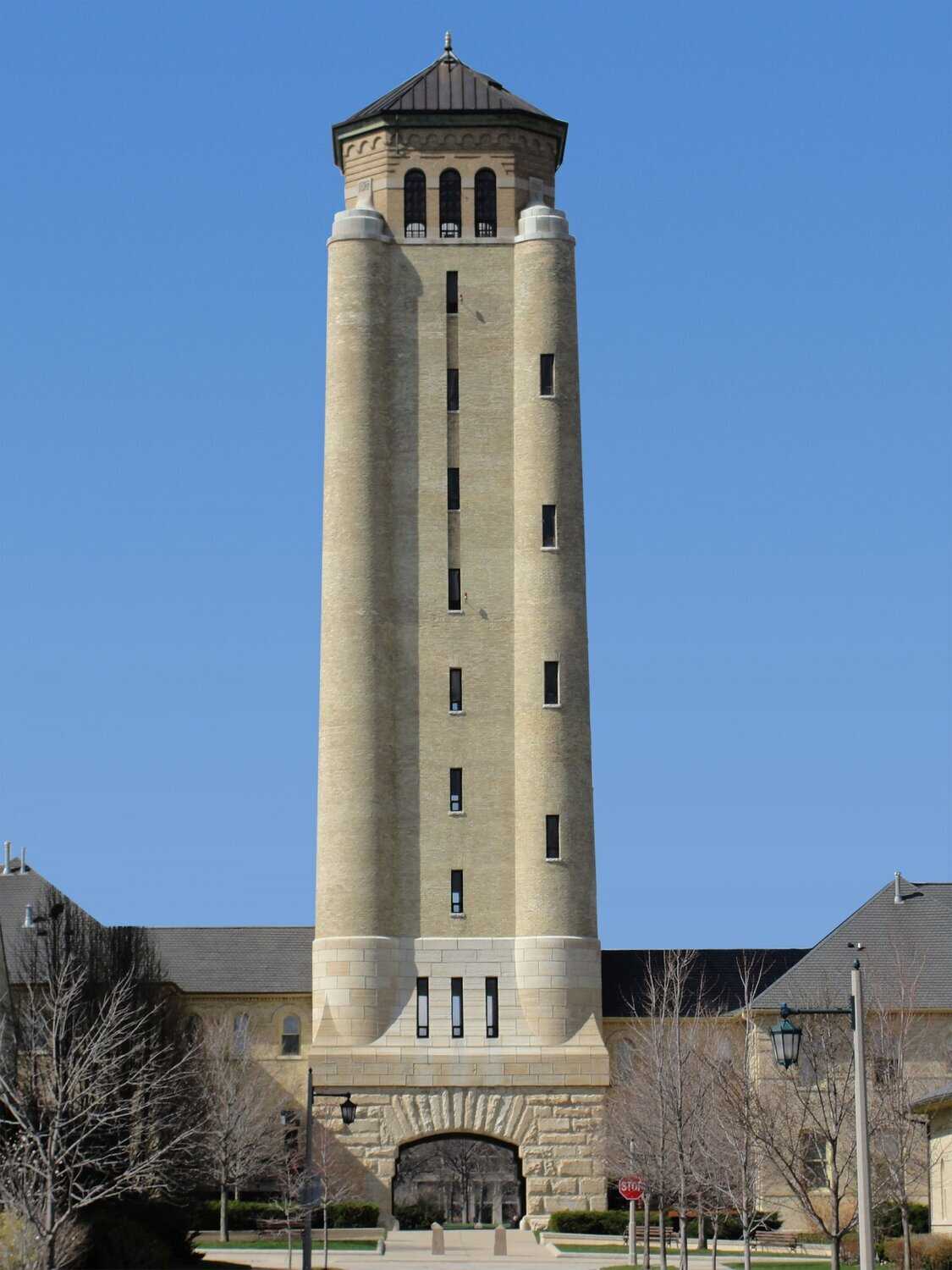 Exterior view of brick tower with stacked vertical windows