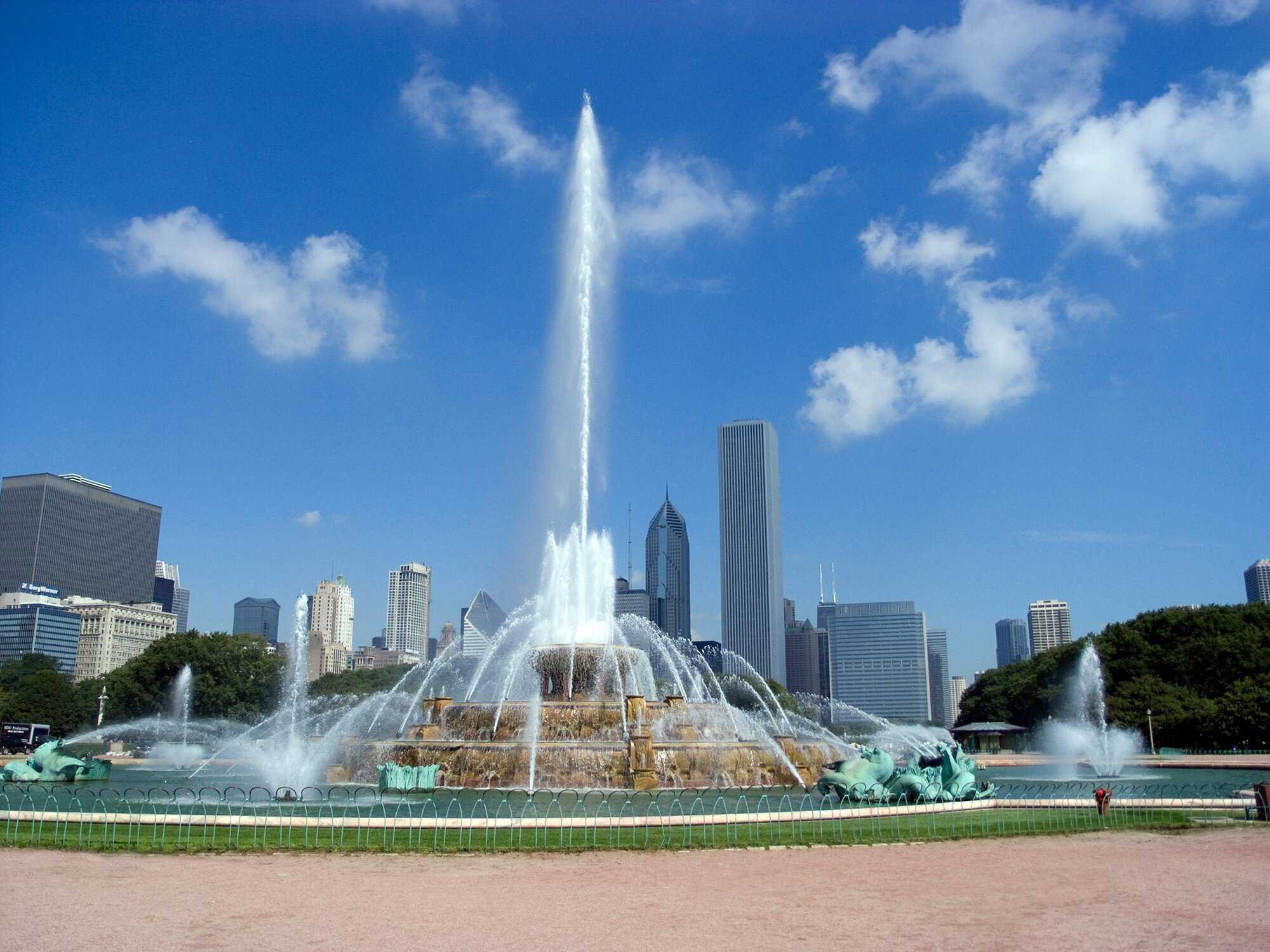 A photo of Buckingham Fountain set against a blue sky.