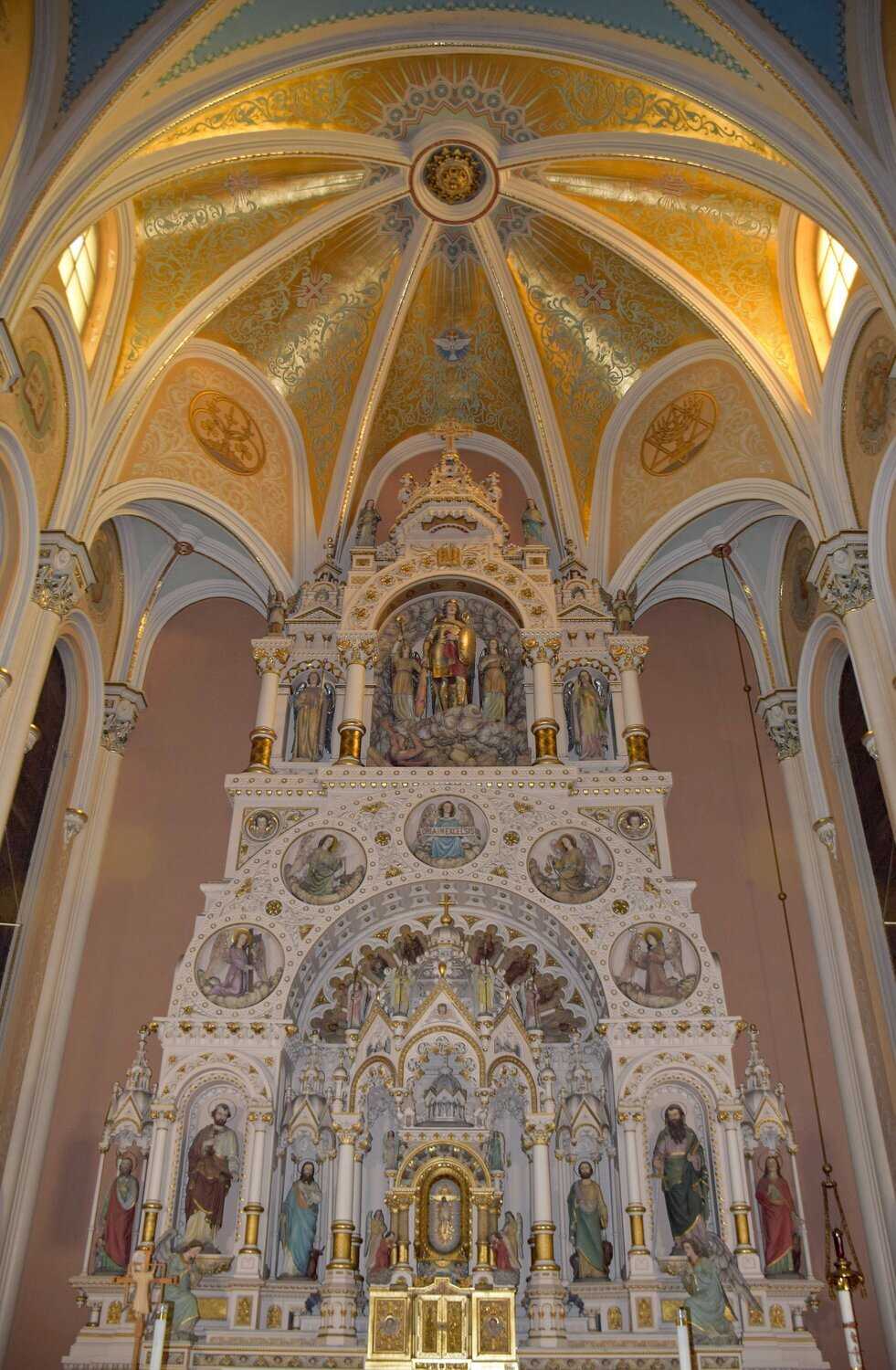 Interior view of gothic church with white arches