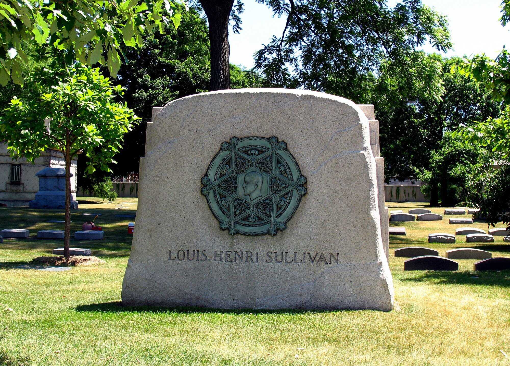 Large irregular stone memorial with engraved plaque