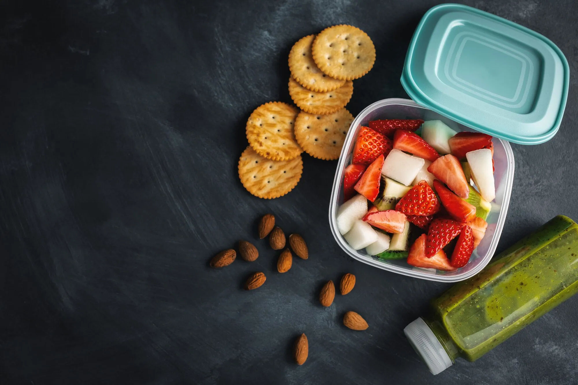 Portable breakfast box with fruit, nuts and whole-grain crackers
