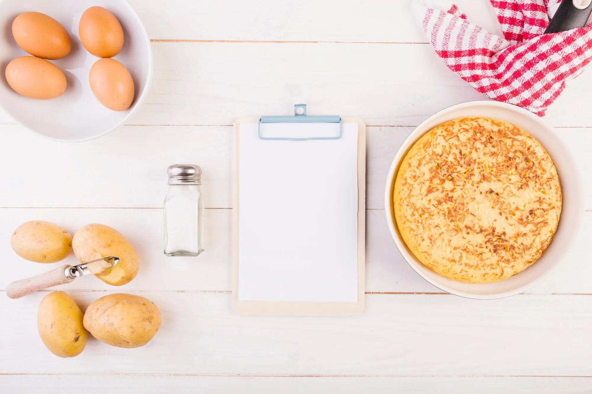 Recipe notes beside ingredients and a prepared dish