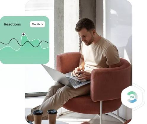 Market research analyst reviewing trend charts and data on a laptop