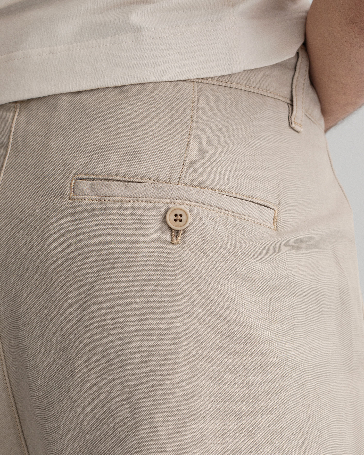 D2. TAPERED PLEAT CHINOS