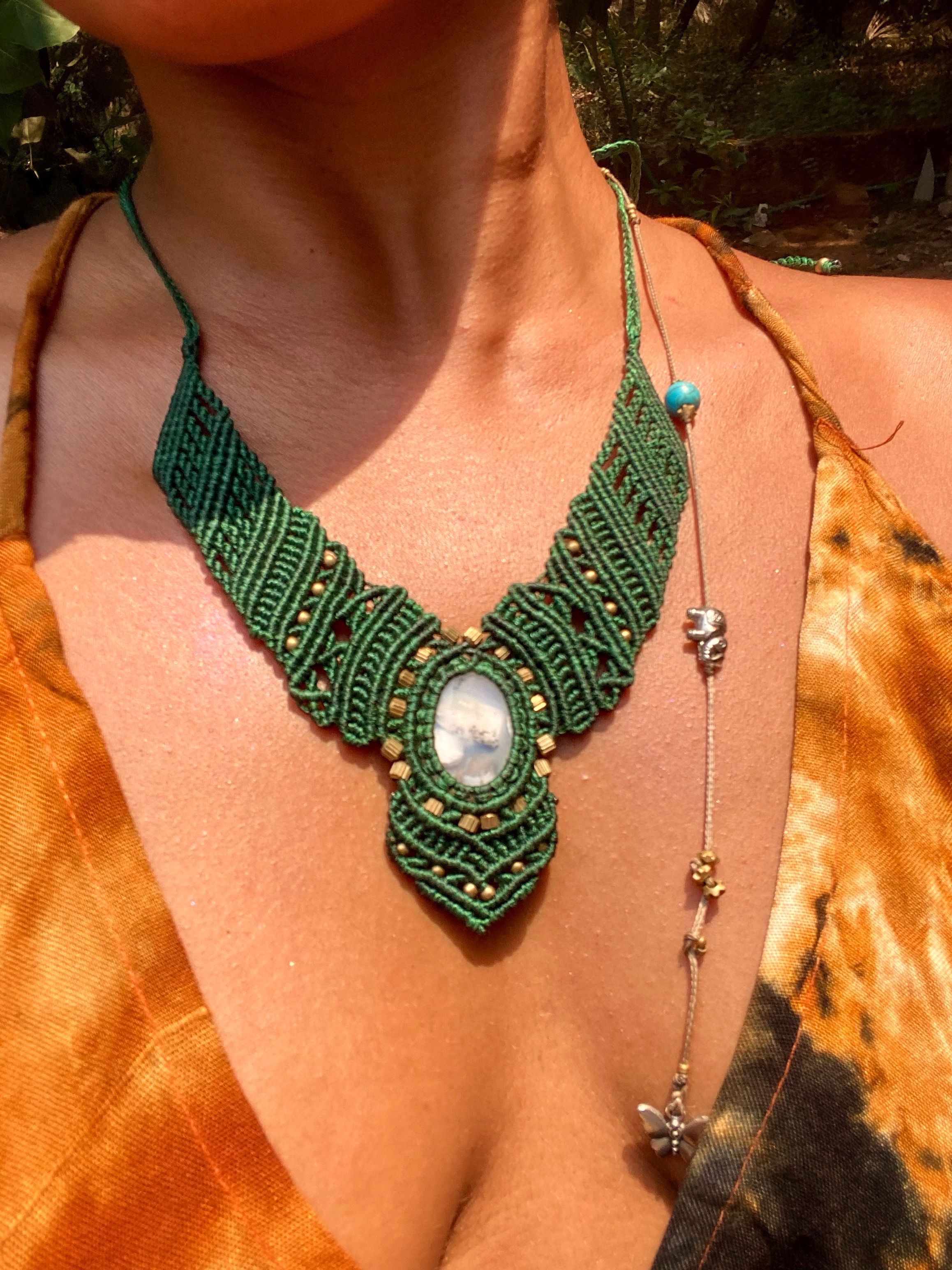 Namura — Deep green macrame cord handwoven around a natural agate stone, finished with subtle brass bead detailing., necklaces — Jhōlâ