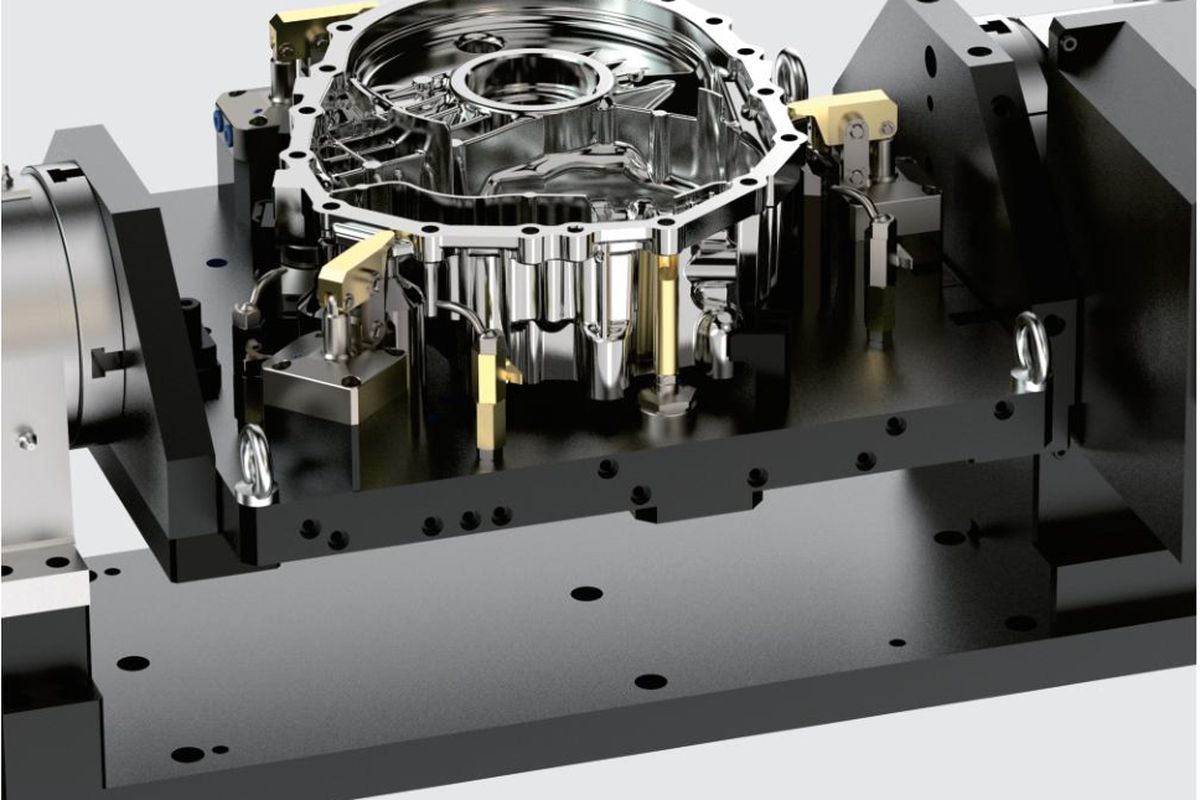 Customized hydraulic fixture engineered around a specific part geometry.
