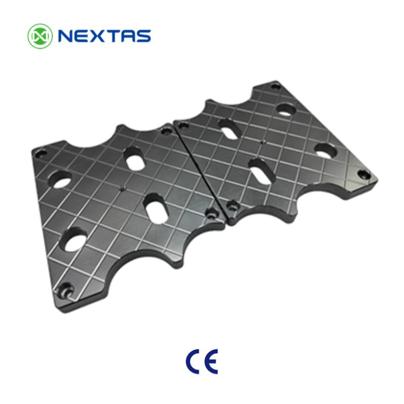 Black machined plates with grid pattern
