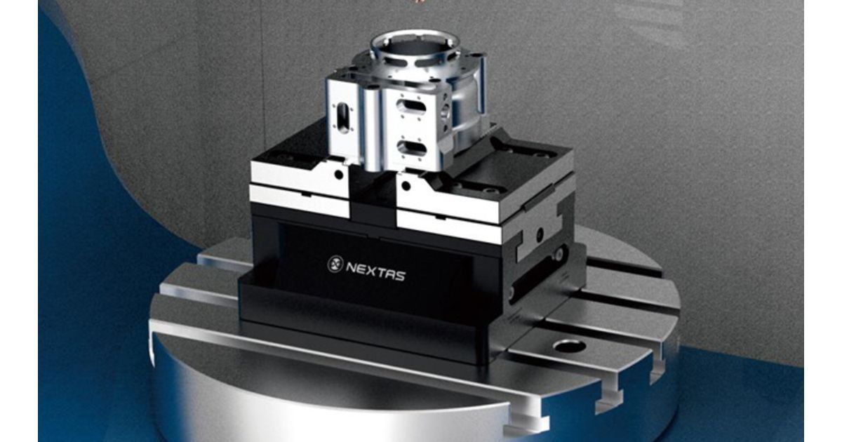 Pneumatic vise holding a machined part on a rotary table