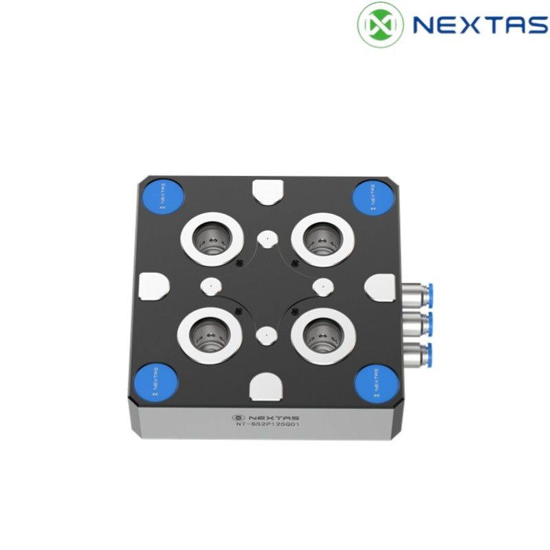 A 5-axis machine using a zero point plate to elevate the workpiece for improved tool access.