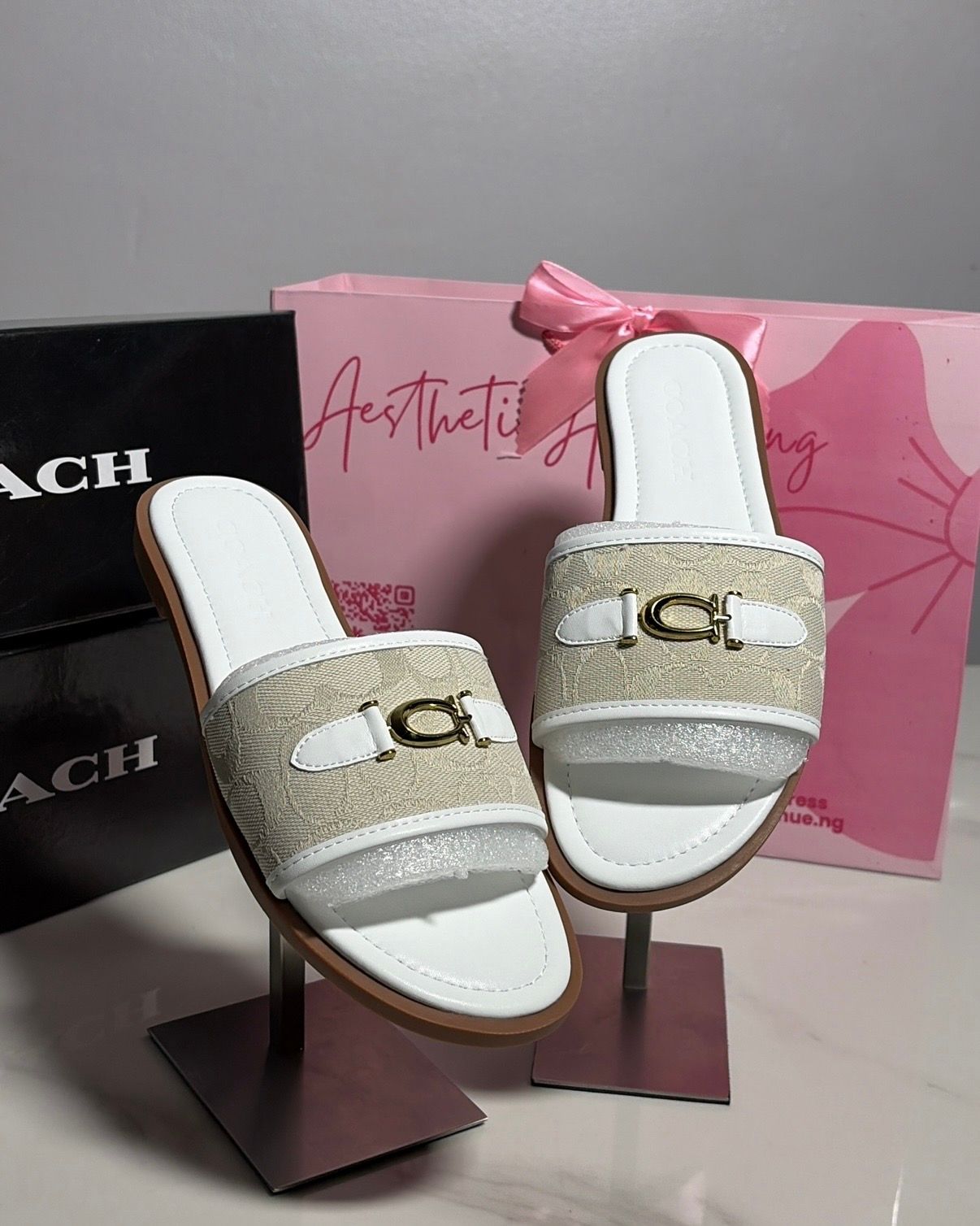 White and Tan Coach Slippers