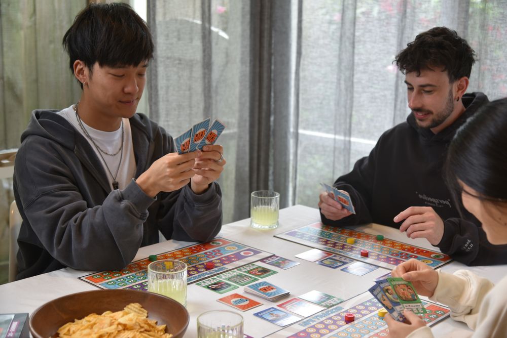 Players holding cards mid-game