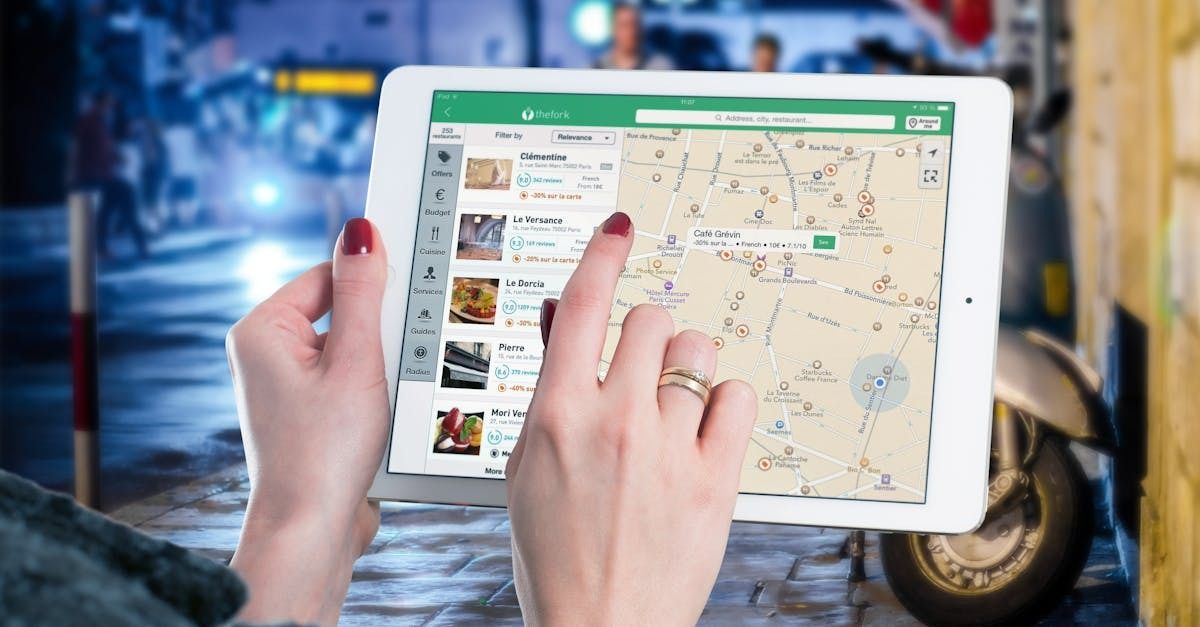 woman looking at a city map on a tablet