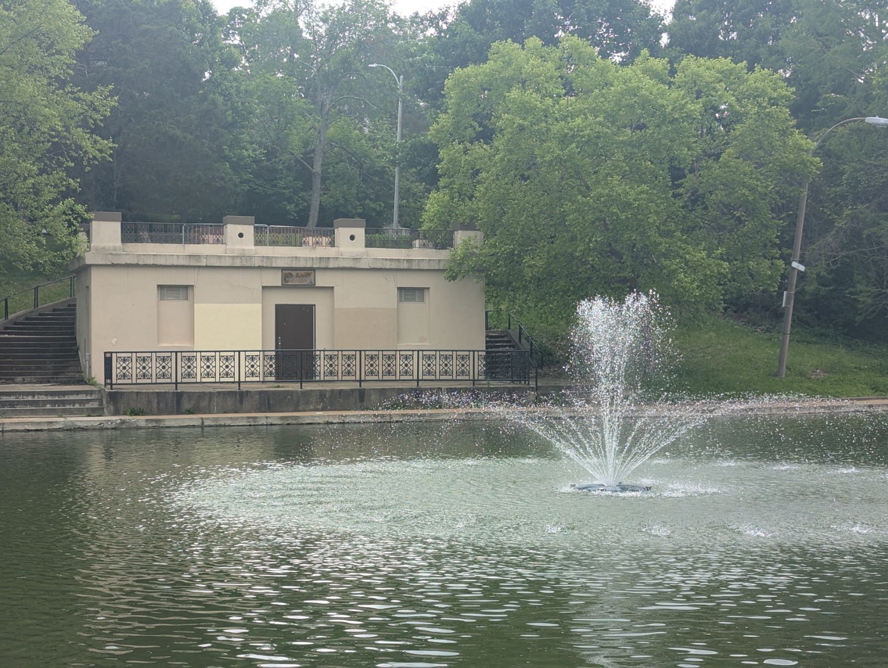 Clifton Heights Park and its lake at the geographic center of the Clifton Heights neighborhood in southwest St. Louis, Missouri — the 4.4-acre Victorian-era park dedicated to the City in 1912