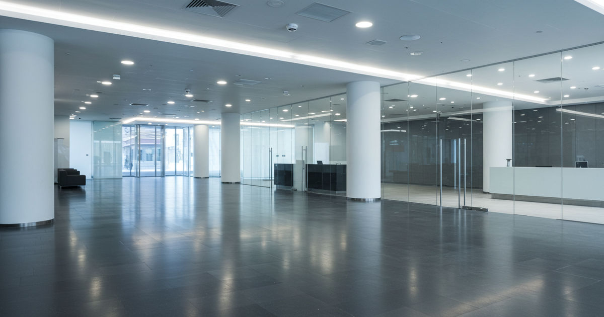 A professional janitorial crew cleaning a St. Louis office after hours