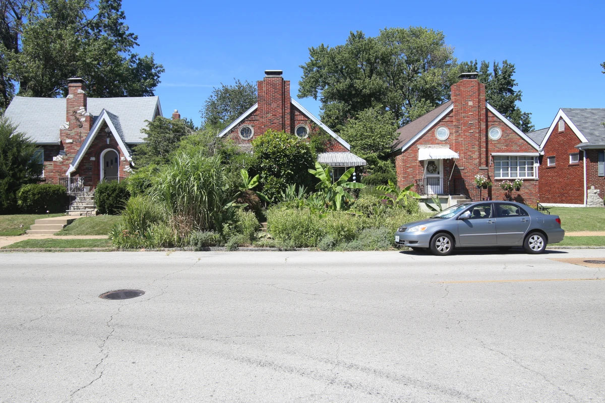 Brick single-family homes along a residential street in the Lindenwood Park neighborhood of St. Louis