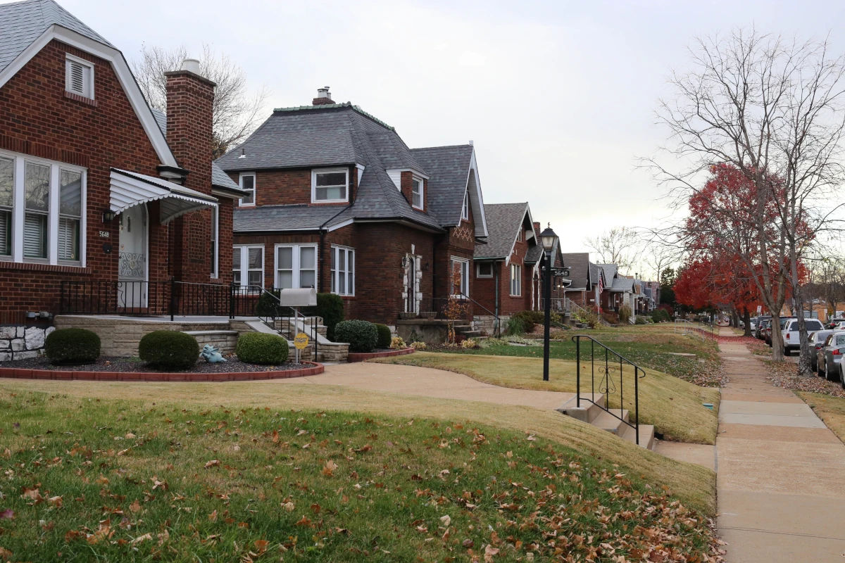 A row of historic early-1900s brick bungalow homes on a tree-lined street in the Princeton Heights neighborhood of south St. Louis
