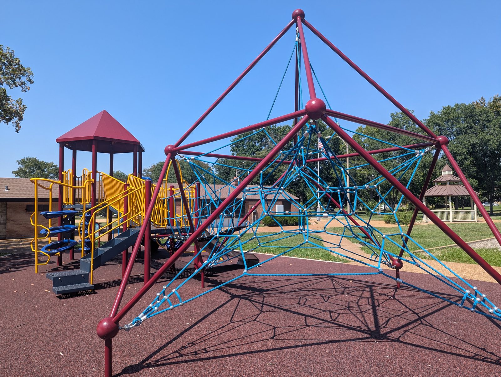 A blue rope pyramid climber at Lindenwood Park in St. Louis