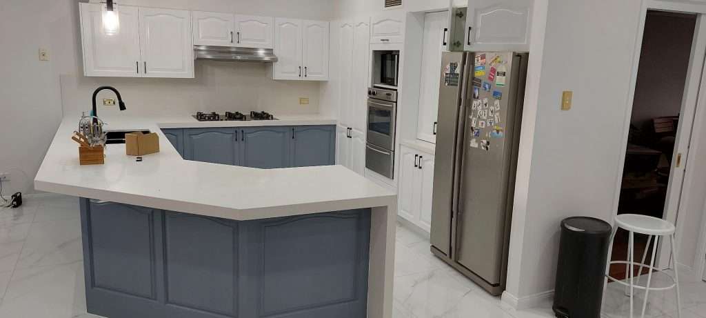 Bright and airy kitchen with white walls and colorful accents