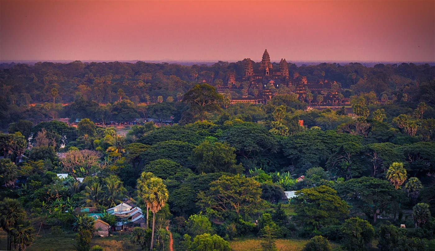 Angkor wat from the distance - cambodia itinerary should definitely include a few days stay in siem reap to visit the temples of angkor.